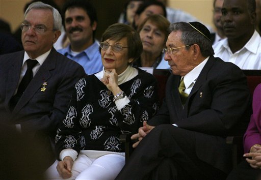Cuba's President Raul Castro, right, sits next to Adela Dworin, president of Cuba's Jewish community, during a Hanukkah ceremony at the Bet Shalom synagogue in Havana, Cuba, Sunday Dec. 5, 2010. (AP Photo/Ismael Francisco, Prensa Latina)